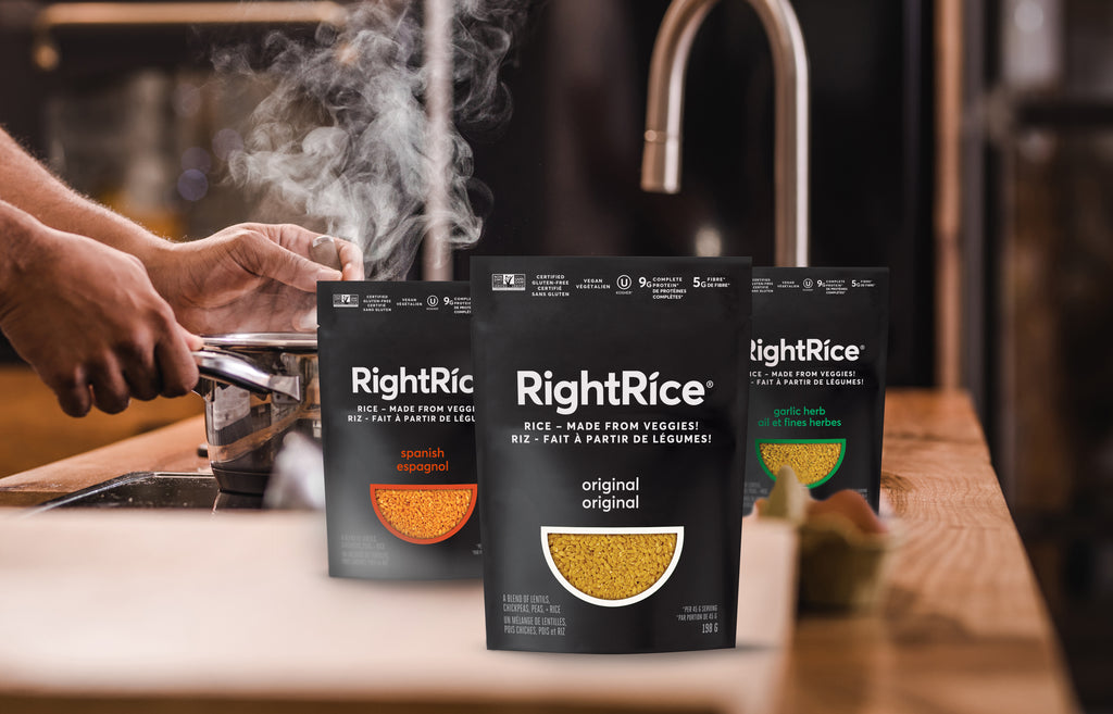 Rice alternative RightRice, package of RightRice Spanish, Original, and Garlic Herb with Canadian labeling on countertop with person prepping in background